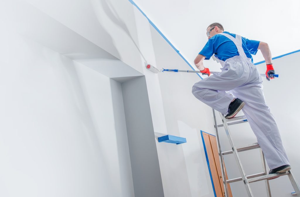 M&M Painting Contractors painting in a residential home.