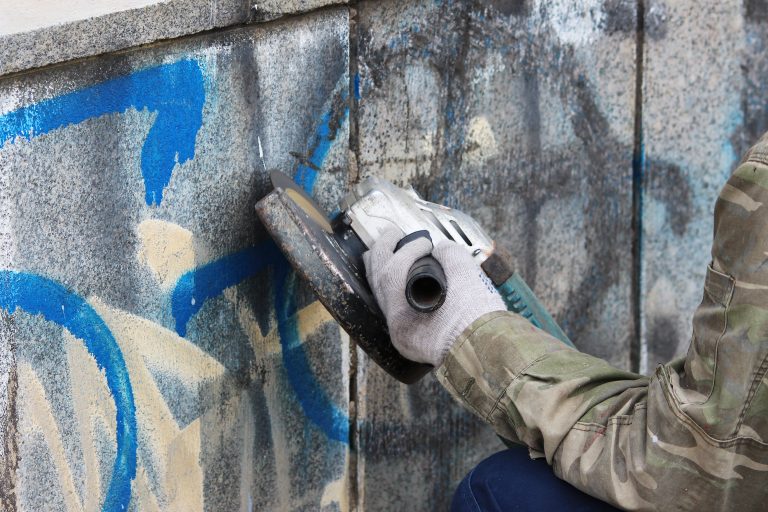 M&M Painting Contractors uses soda blasting to remove graffiti.