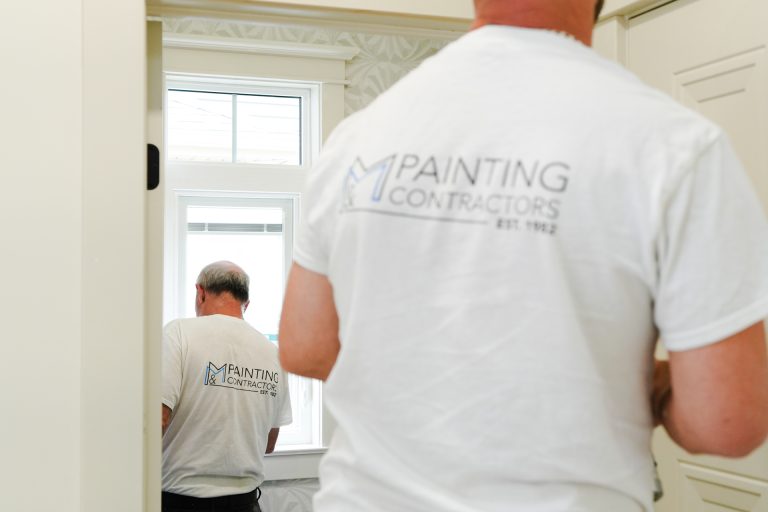 M&M Painting Contractors painting in a residential home.