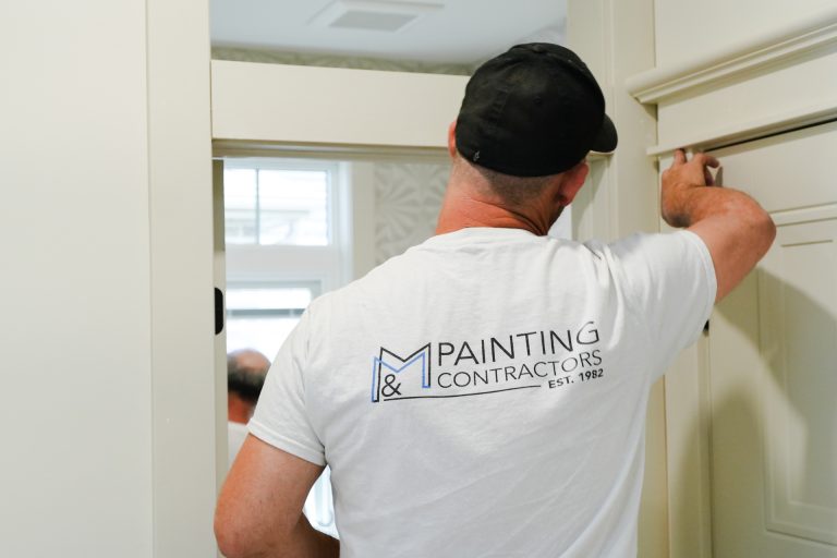 M&M Painting Contractors painting in a residential home.