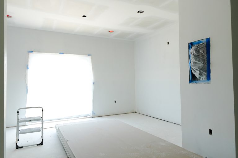 M&M Painting Contractors painting in a new apartment building.