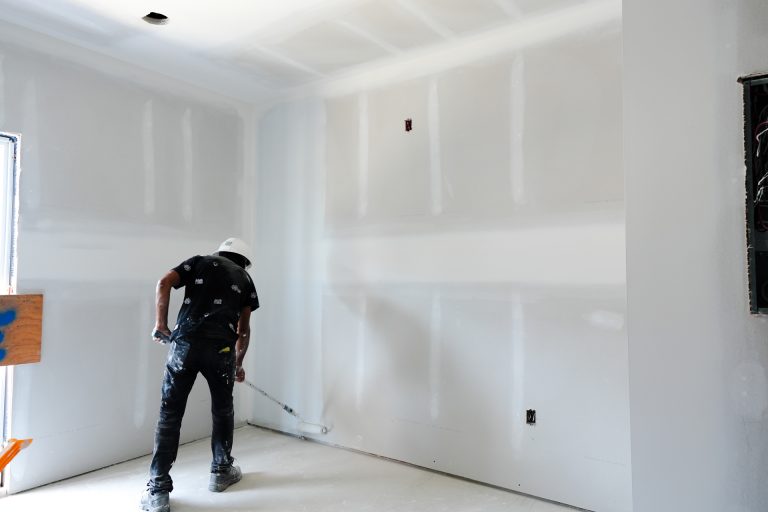 M&M Painting Contractors painting in a new apartment building.