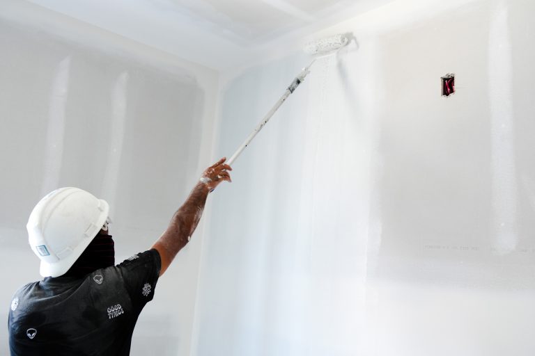 M&M Painting Contractors painting in a new apartment building.